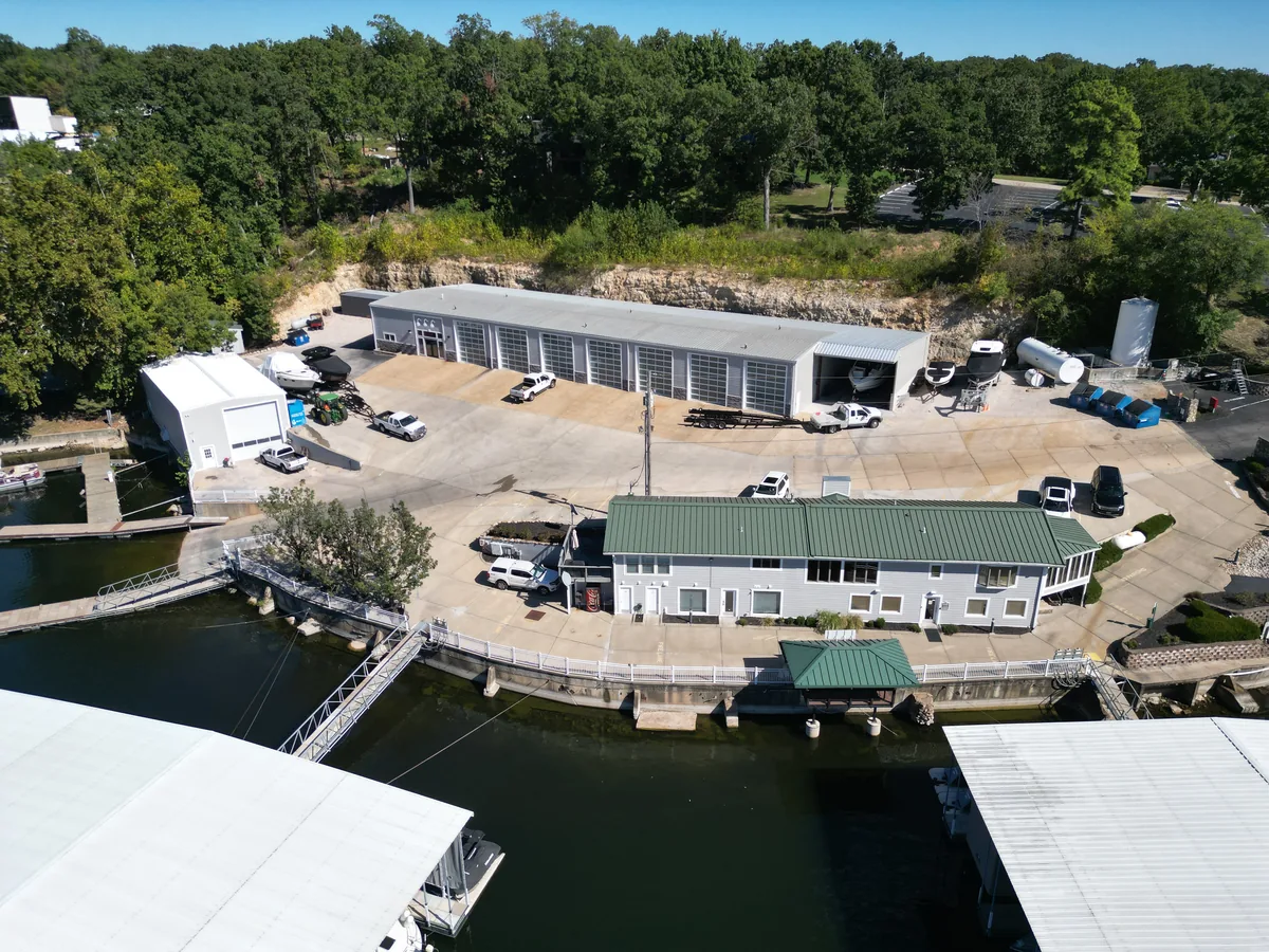 Aerial view of Village Marina's service bays, waterfront office and docks