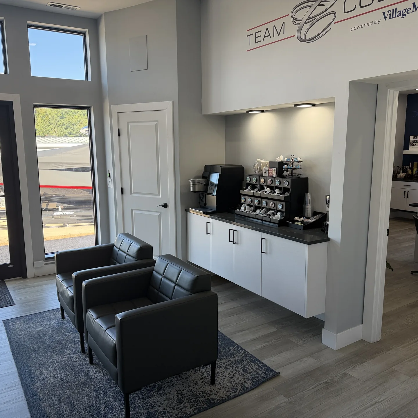 Village Marina customer lounge with seating and a coffee station